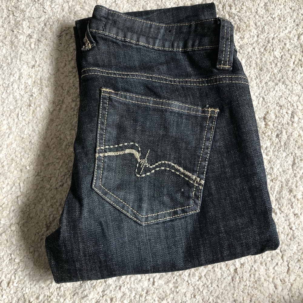 Distressed looking UB Jeans.